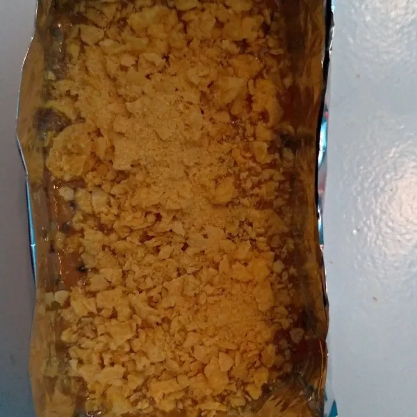Jika telur dan corn flakes ada sisa biasa ditaruh di alumunium foil lalu ikut dipanggang.