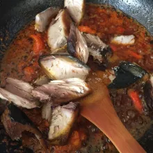 Kemudian masukkan ikan goreng, beri gula dan garam. Masak sampai matang kemudian sajikan.