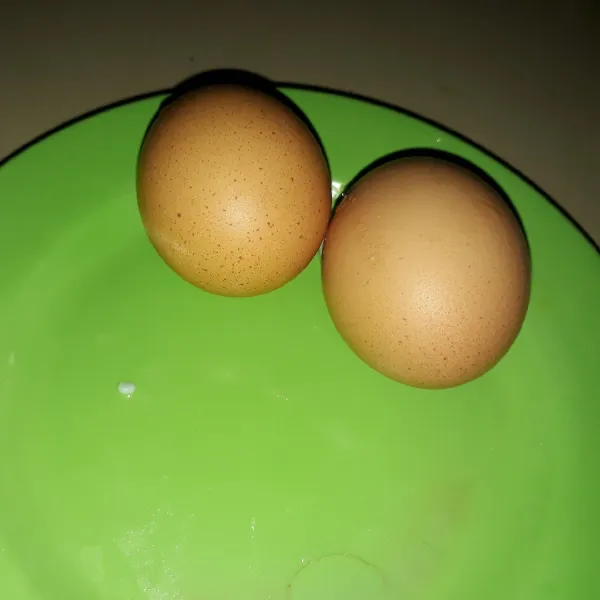 rebus 2 butir telur