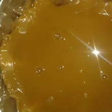Masukkan ke dalam loyang yang sudah dialasi plastik kue.