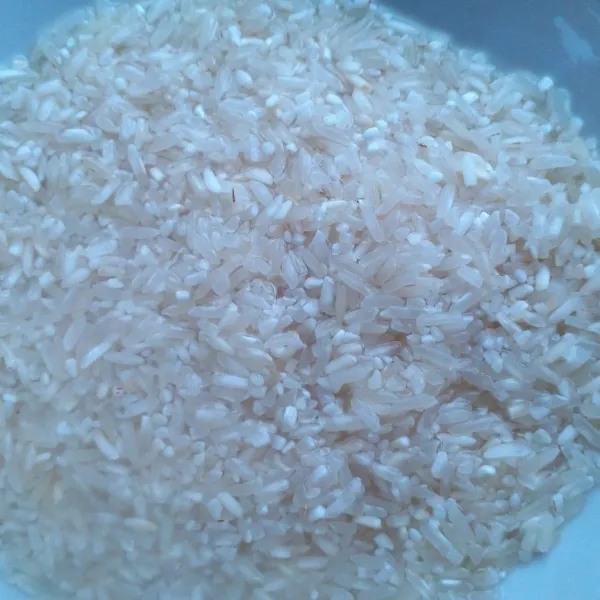 Cuci beras 2 kali, tiriskan.