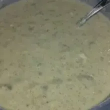 Masukkan tepung. Aduk rata. Masukkan margarin cair, aduk rata.