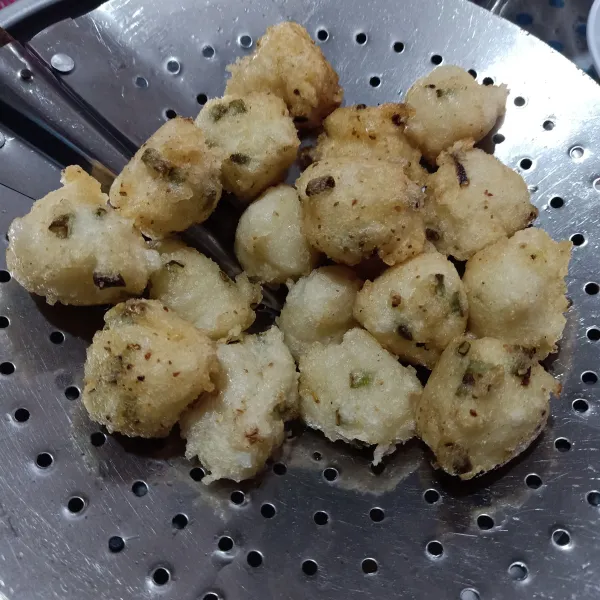 Tiriskan agar minyaknya turun