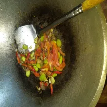 Masukkan irisan cabe, tomat dan petai. Tumis sampai layu.