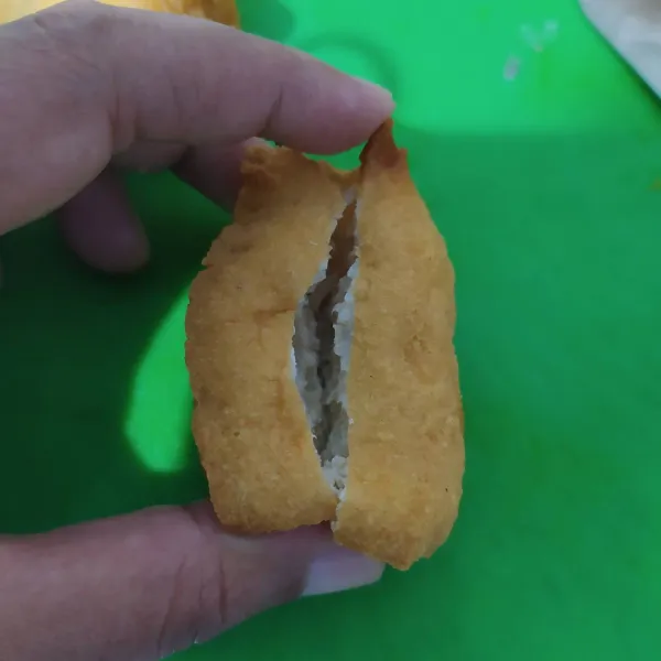 Belah tahu kempos jangan sampai putus.