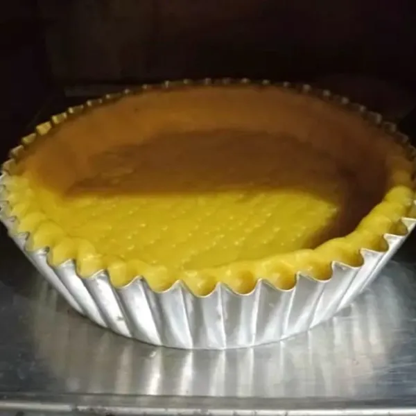 Oven dengan suhu 150°C hingga permukaan matang kuning keemasan.