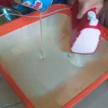 Masukkan susu, pelembut, susu bubuk, tepung terigu. Terakhir masukkan mentega, aduk asal rata.