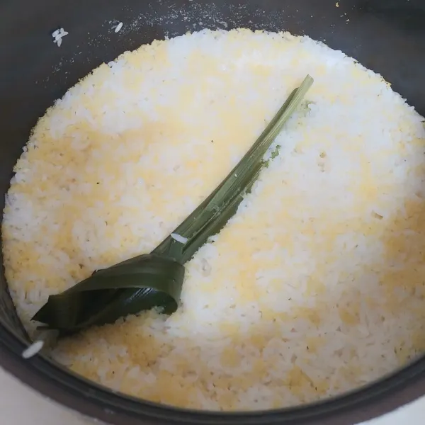 Masak sampai beras matang.
