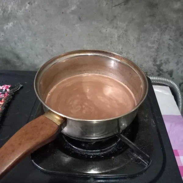 Masak semua bahan lapisan 2 sampai berbusa dan matikan kompor.