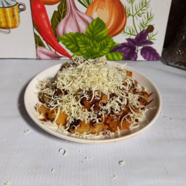Taburi dengan keju parut.