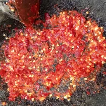 Ulek cabai rawit, cabai keriting, bawang merah, bawang putih dan terasi.