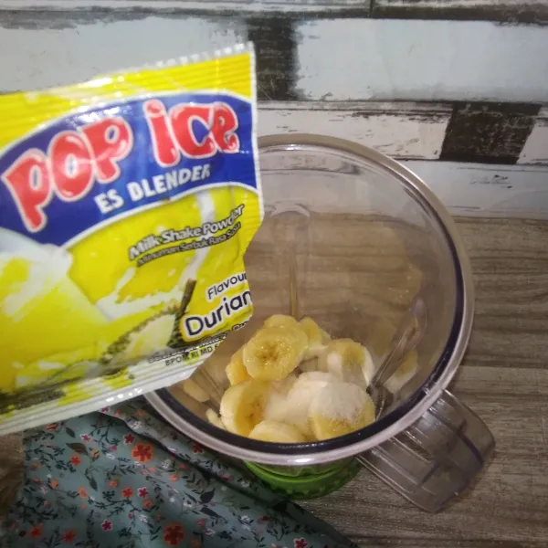 Masukkan minuman serbuk pop ice rasa durian.