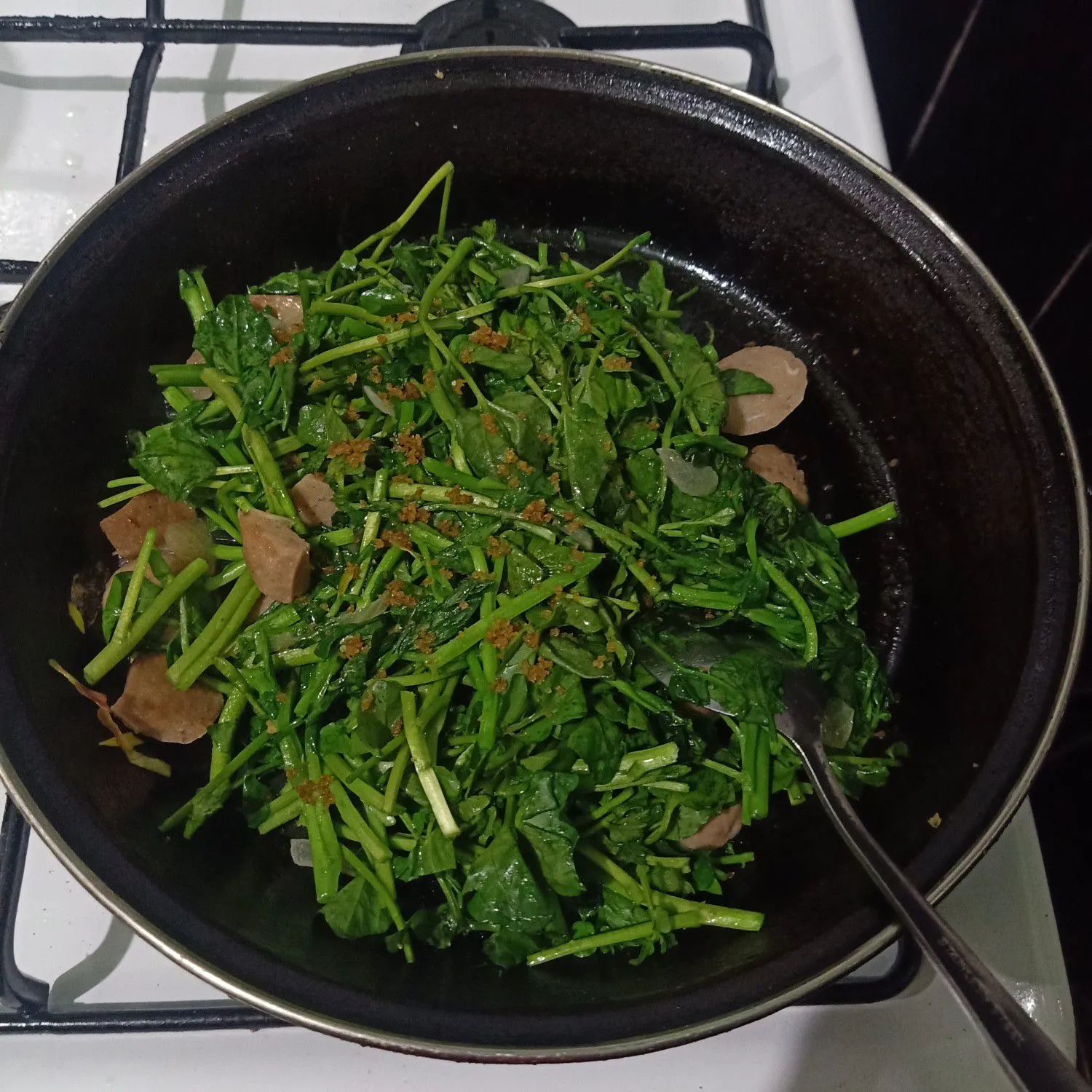 Step 5 Oseng pedas selada air jagung baso