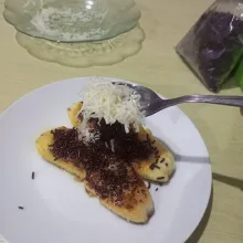 Tambahkan parutan keju.