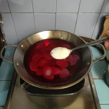 Masukkan gula pasir, rebus hingga mendidih dan gula larut.