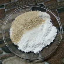 Masukkan kelapa parut, tepung terigu, tepung beras, gula pasir, wijen, dan baking powder ke dalam wadah.
