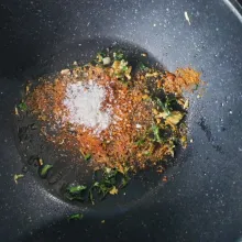 Diwajan terpisah, panaskan minyak. Tumis bawang dan daun jeruk. Tambahkan cabe bubuk, garam dan gula, aduk merata.