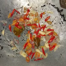 Tumis bawang merah, bawang putih, cabai rawit, cabai keriting, dan daun jeruk hingga layu.