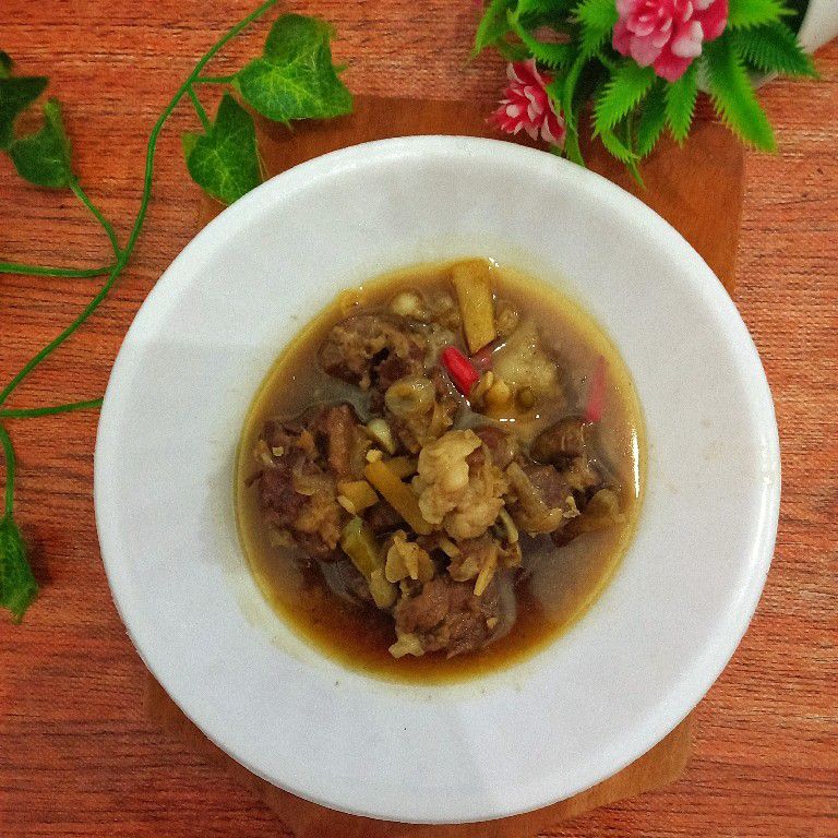 Kecap masak dalam wadah tradisional