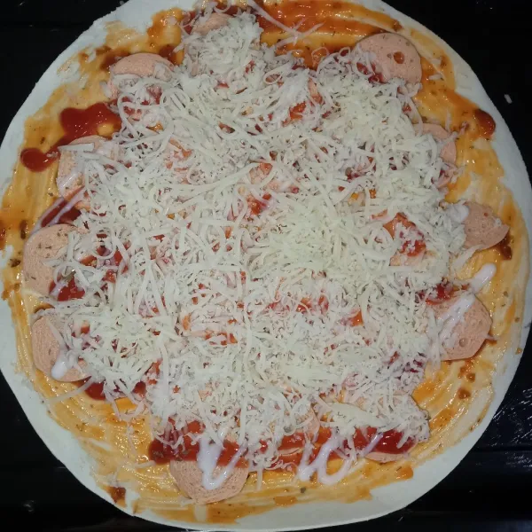 Tambahkan parutan mozarella.