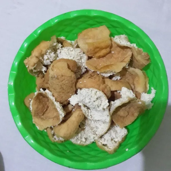 Bagi 2 tahu pong, lalu balikkan seperti di gambar.