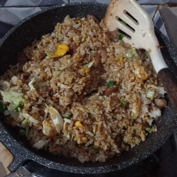 Aduk sampai tercampur rata. Masak sampai tanak dan koreksi rasa