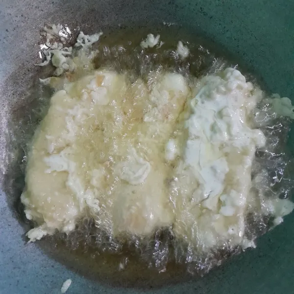Goreng kembali sampai kuning keemasan.
