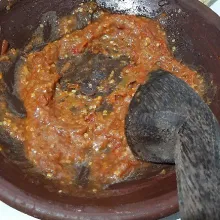 Goreng semua bahan sambal kemudian haluskan, koreksi rasa lalu sajikan bersama ikan.