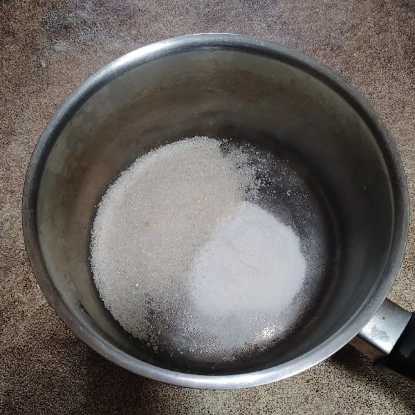 Masukan bubuk jelly rasa kelapa, tambahkan 5 sdm gula pasir.