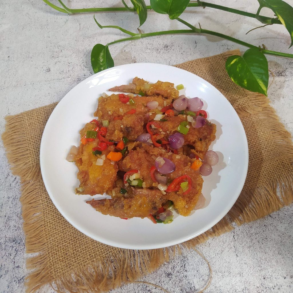 Proses memasak oseng paru-ayam di wajan