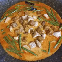 Masukkan ikan asin, tempe dan tahu, aduk sesekali agar santan tidak pecah.