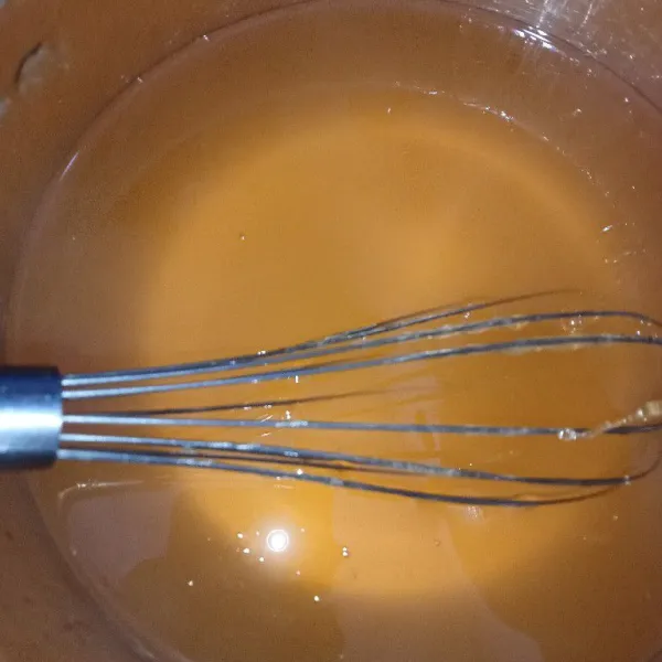 Campur jeli kaca jeruk aduk rata masak hingga mendidih lalu matikan api.