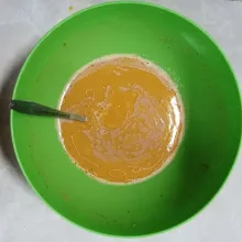 Tambahkan susu cair, margarin cair aduk rata, saring juga perlu