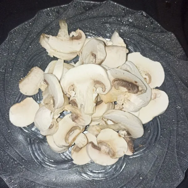 Iris jamur kancing.