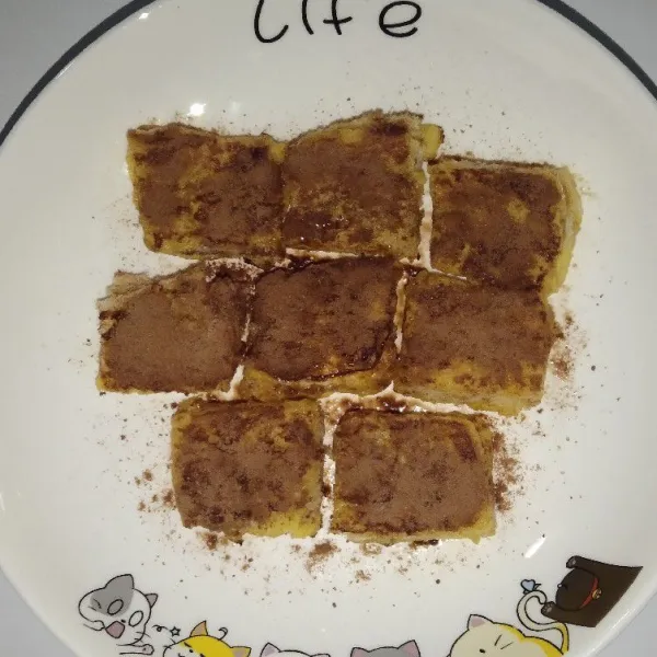 Taburkan kembali dengan cokelat bubuk sebagai topping.